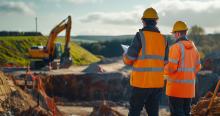 two geotechnical engineers on a project site